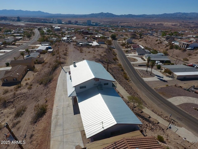 birds eye view of property with a residential view and a mountain view