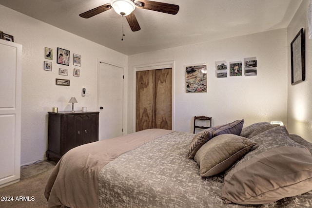 carpeted bedroom featuring ceiling fan