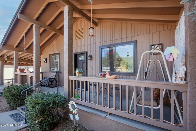 property entrance with a porch