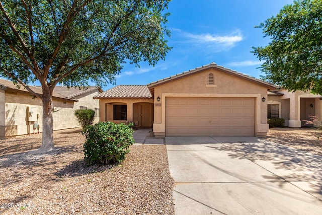 30212 N Sunray Dr, San Tan Valley, AZ 85143 - mediterranean / spanish home featuring stucco siding, an attached garage, concrete driveway, and a tile roof