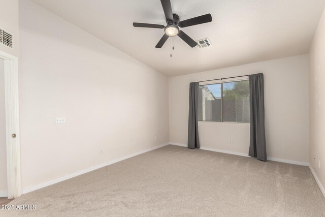 30212 N Sunray Dr, San Tan Valley, AZ 85143 - spare room featuring light carpet, ceiling fan, baseboards, and lofted ceiling