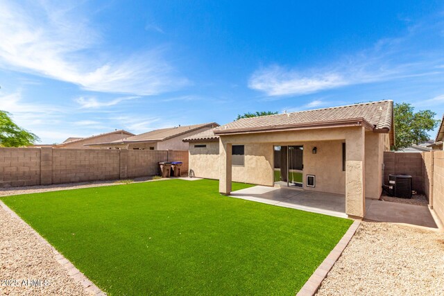 30212 N Sunray Dr, San Tan Valley, AZ 85143 - rear view of house with central AC unit, stucco siding, and a tiled roof
