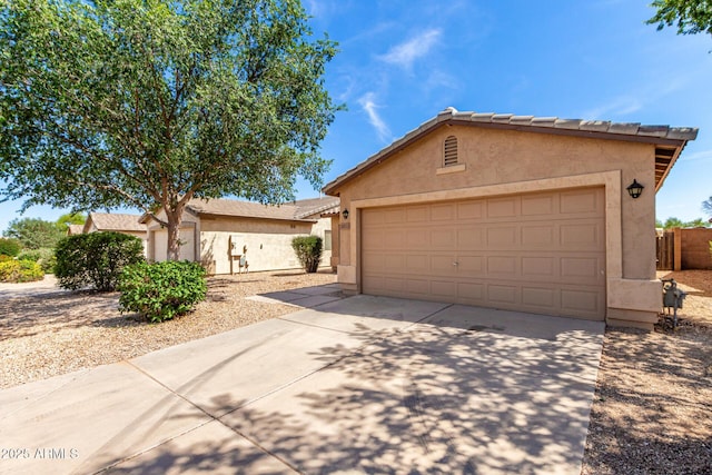 30212 N Sunray Dr, San Tan Valley, AZ 85143 - view of front of home with stucco siding, concrete driveway, and an attached garage