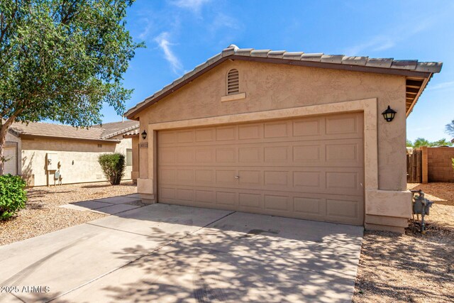 30212 N Sunray Dr, San Tan Valley, AZ 85143 - view of front facade featuring stucco siding, a tiled roof, driveway, and a garage