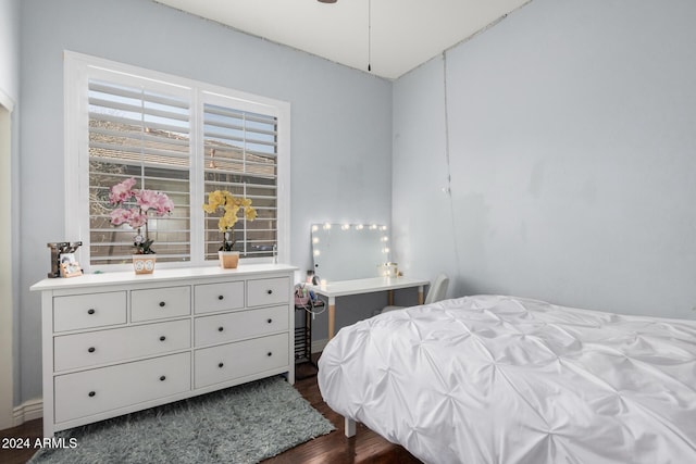 bedroom featuring dark hardwood / wood-style floors