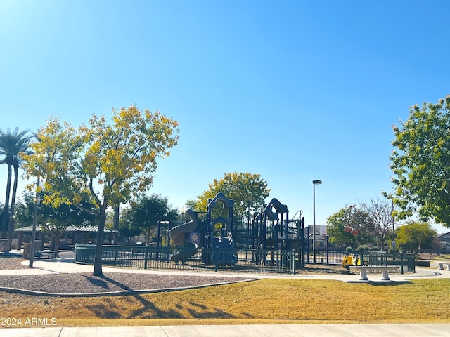 view of home's community featuring a playground