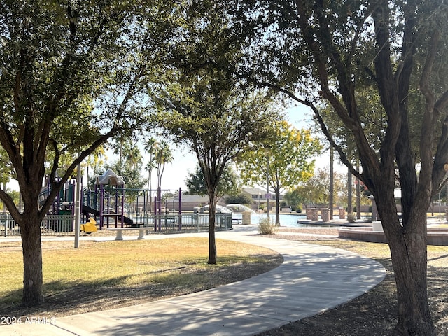 view of home's community with a playground