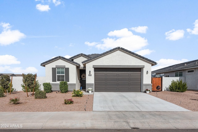 single story home with a garage