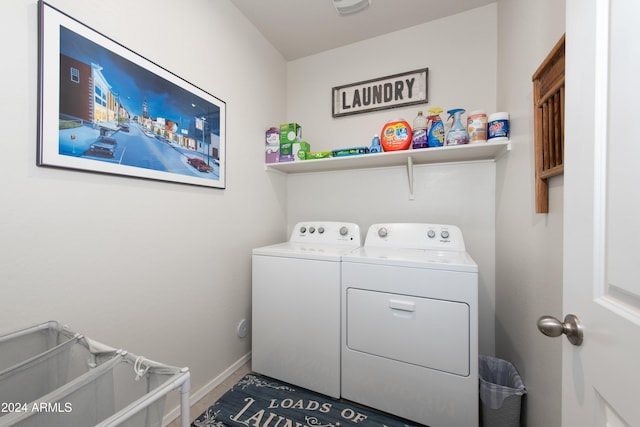 laundry room with washing machine and dryer