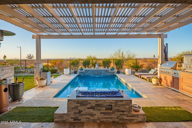 pool at dusk featuring an outdoor kitchen, a fenced in pool, a fenced backyard, grilling area, and a pergola