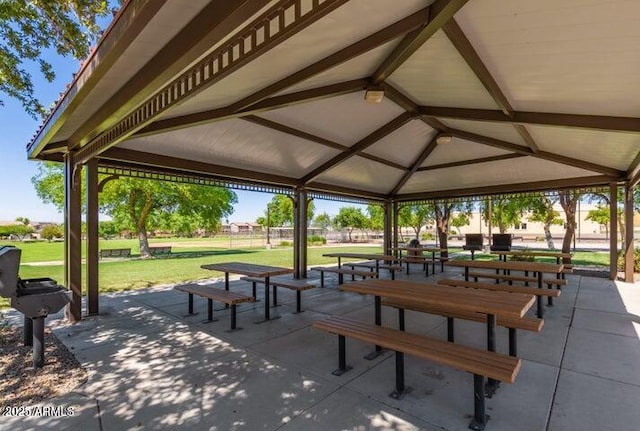 surrounding community with a yard, a patio, and a gazebo