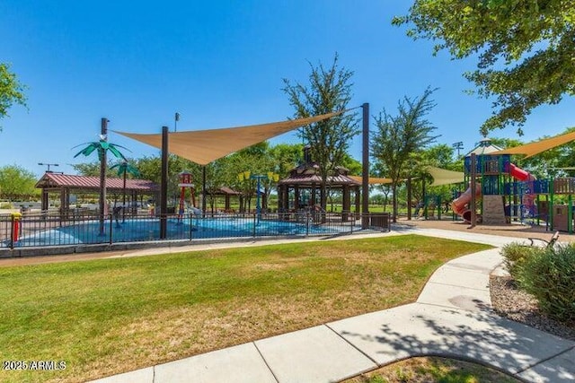 community jungle gym with a gazebo and a yard