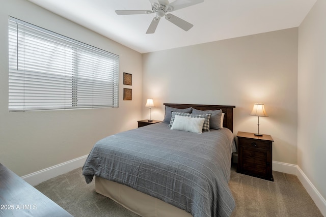 bedroom featuring carpet, a ceiling fan, and baseboards