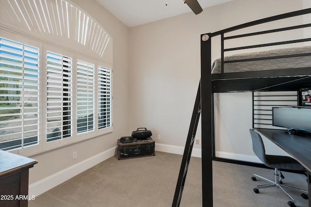 unfurnished bedroom with carpet and baseboards