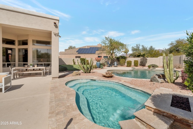 view of swimming pool with a patio area, a fenced backyard, and a fenced in pool