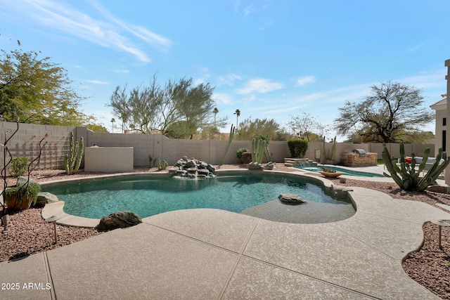 view of pool featuring a fenced in pool, a patio area, and a fenced backyard