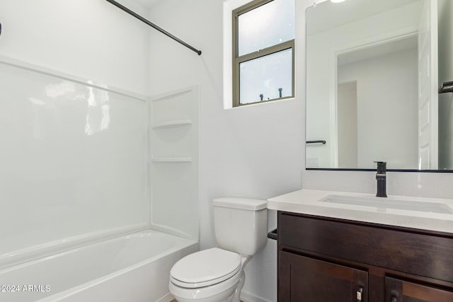 full bathroom with shower / bathing tub combination, vanity, and toilet