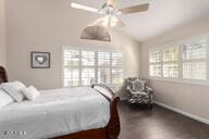 bedroom with vaulted ceiling and ceiling fan