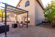 view of patio / terrace featuring a pergola and an outdoor fire pit