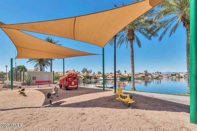 view of playground featuring a water view