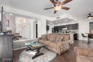 living room featuring ceiling fan