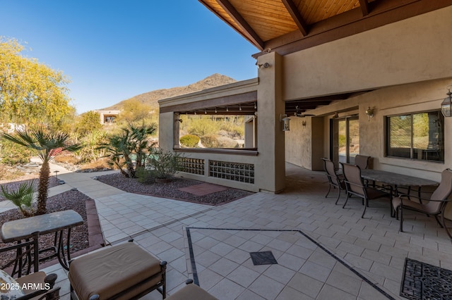 view of patio with a mountain view