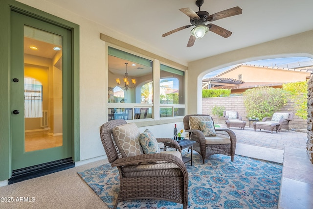 view of patio / terrace featuring ceiling fan, visible vents, and fence