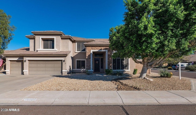 view of front of home featuring a garage