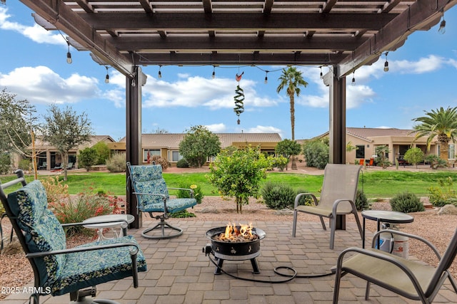 view of patio with a fire pit and a pergola