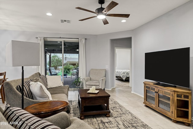 living room featuring light tile patterned floors, recessed lighting, visible vents, ceiling fan, and baseboards