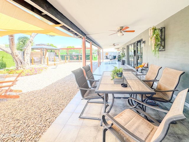 11215 N 37th Ave, Phoenix, AZ 85029 - view of patio featuring outdoor dining space and a ceiling fan