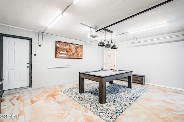 11215 N 37th Ave, Phoenix, AZ 85029 - rec room featuring a garage, a textured ceiling, concrete floors, and billiards table