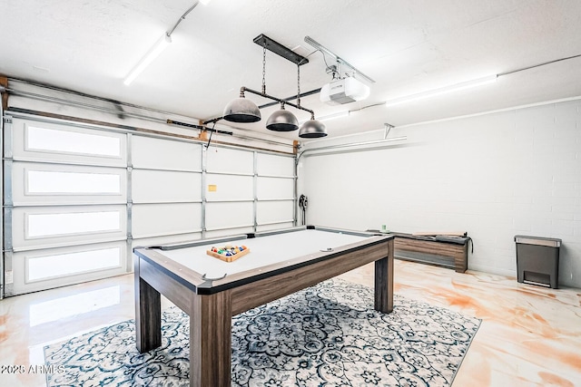 11215 N 37th Ave, Phoenix, AZ 85029 - recreation room featuring concrete block wall, billiards, and a garage