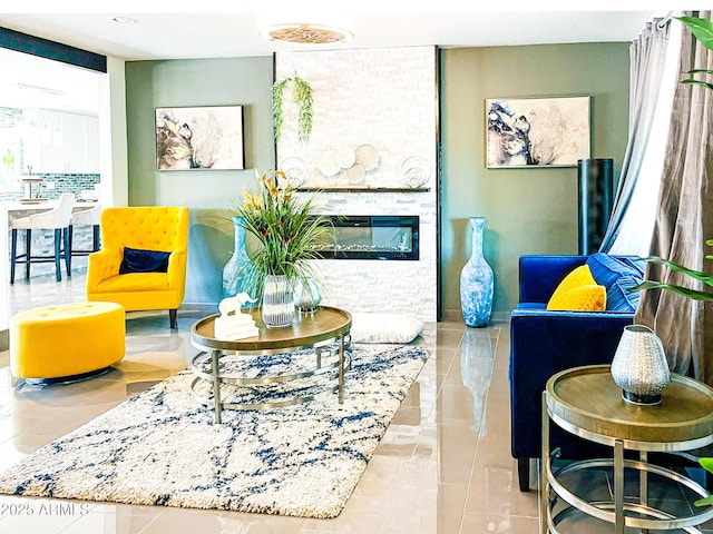 11215 N 37th Ave, Phoenix, AZ 85029 - living room featuring tile patterned floors and a fireplace