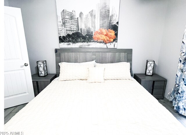 11215 N 37th Ave, Phoenix, AZ 85029 - bedroom featuring wood finished floors and a view of city