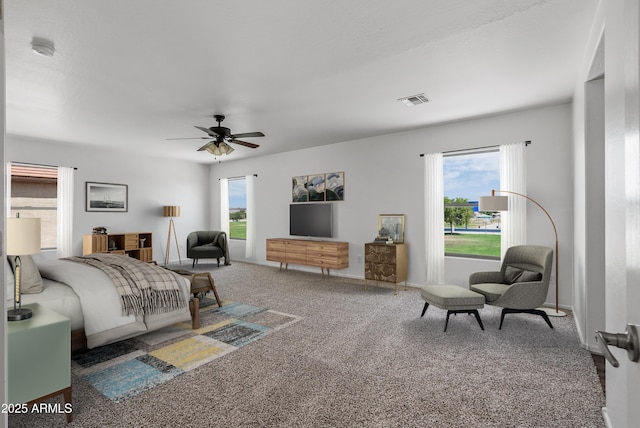 carpeted bedroom with ceiling fan