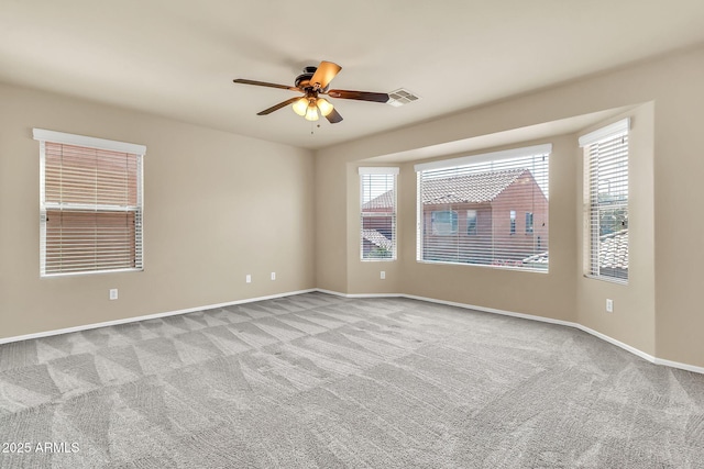 121 W Hackberry Dr, Chandler, AZ 85248 - spare room with carpet, a ceiling fan, and baseboards
