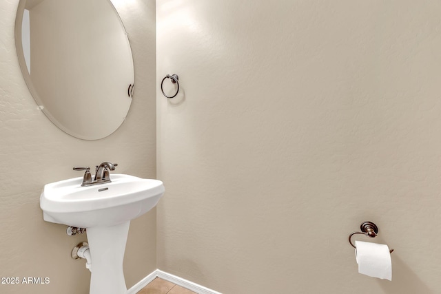 121 W Hackberry Dr, Chandler, AZ 85248 - bathroom with tile patterned floors, a sink, and baseboards