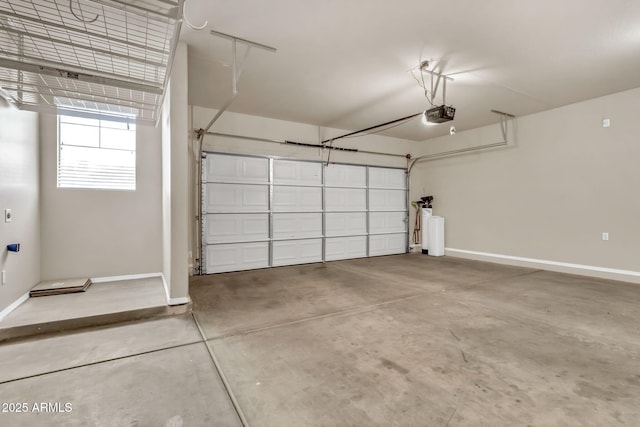 121 W Hackberry Dr, Chandler, AZ 85248 - garage with baseboards and a garage door opener