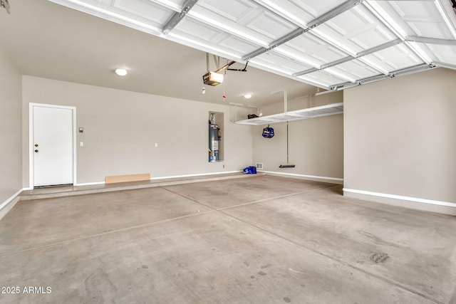 121 W Hackberry Dr, Chandler, AZ 85248 - garage with water heater, a garage door opener, and baseboards