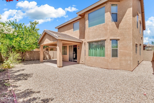 121 W Hackberry Dr, Chandler, AZ 85248 - back of house with stucco siding, a patio area, and a fenced backyard
