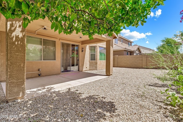 121 W Hackberry Dr, Chandler, AZ 85248 - back of house with a fenced backyard, a patio area, and stucco siding