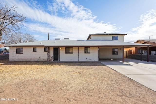 view of front of home featuring brick siding