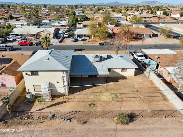 aerial view featuring a mountain view and a residential view