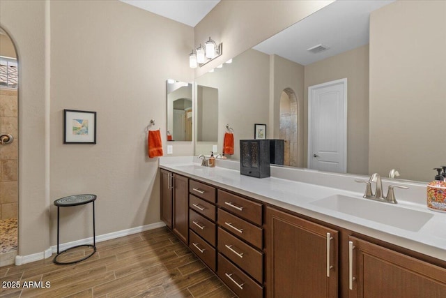 10914 E Tarragon Ave, Mesa, AZ 85212 - full bathroom with double vanity and wood finished floors