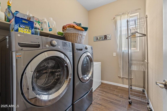 10914 E Tarragon Ave, Mesa, AZ 85212 - laundry room featuring independent washer and dryer and wood finished floors