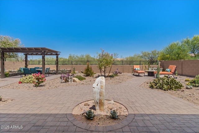 10914 E Tarragon Ave, Mesa, AZ 85212 - fenced backyard featuring a patio area, a pergola, and an outdoor living space with a fire pit