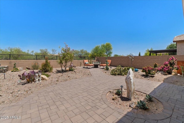 10914 E Tarragon Ave, Mesa, AZ 85212 - fenced backyard featuring a patio area and outdoor lounge area