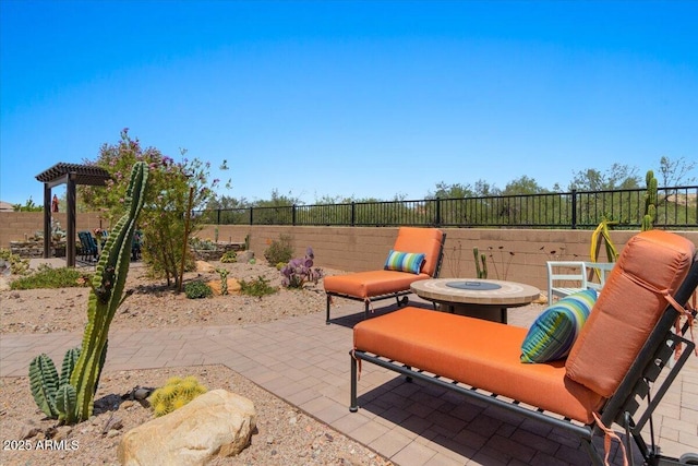 10914 E Tarragon Ave, Mesa, AZ 85212 - fenced backyard with a patio and an outdoor fire pit