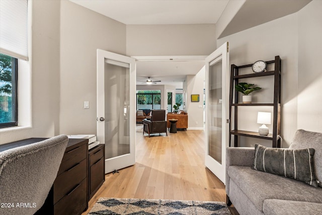 interior space featuring french doors and light hardwood / wood-style floors